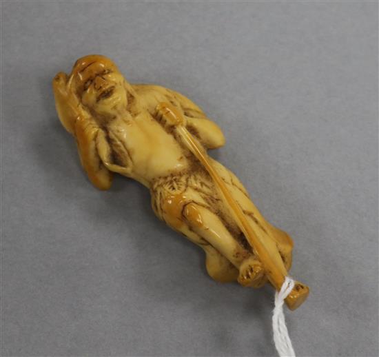 A Japanese ivory figure with frog and staff height 7cm